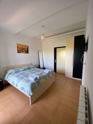 Standardzimmer, 1 Schlafzimmer | 1 Schlafzimmer, Bügeleisen/Bügelbrett, kostenloses WLAN, Bettwäsche