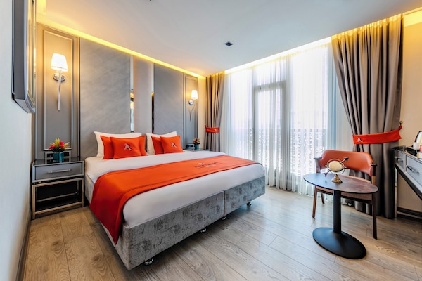 Ropa de cama de alta calidad y minibar