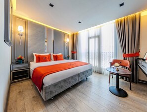 Ropa de cama de alta calidad y minibar 