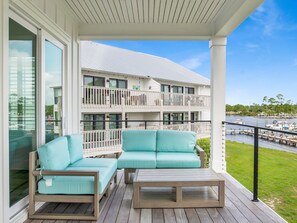 Terrace/patio - The Osprey #7 | Waterfront + Private Elevator and Zero-Entry Community Pool (Orange Beach)