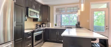 Microwave, toaster, cookware/dishes/utensils