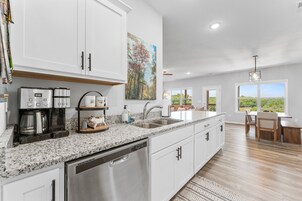 Fridge, oven, coffee/tea maker, toaster