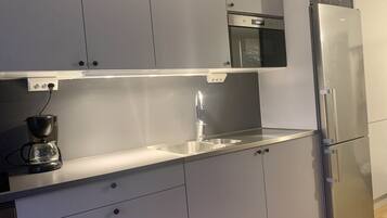 Apartment, 2 Twin Beds | Private kitchen | Fridge, microwave, oven, stovetop