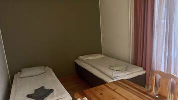Apartment, 2 Twin Beds | 1 bedroom, free WiFi, bed sheets