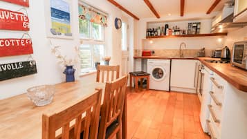 Fridge, electric kettle, toaster, cookware/dishes/utensils