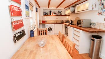 Fridge, electric kettle, toaster, cookware/dishes/utensils