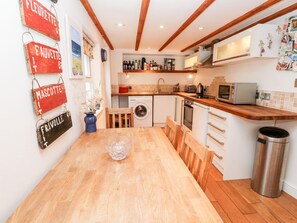 Fridge, electric kettle, toaster, cookware/dishes/utensils