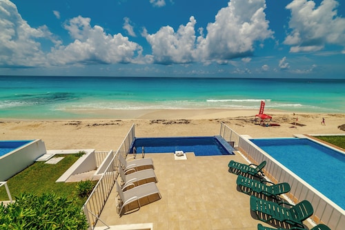 Private Pool in beach front villa • Sleeps 8 • Gated Access