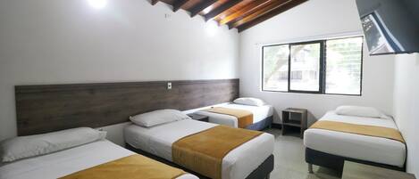 Standard Quadruple Room | Blackout curtains, iron/ironing board, free WiFi, bed sheets