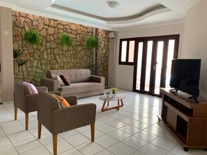 Flat-screen TV - House 3 suites with pool (Capim Macio Natal)