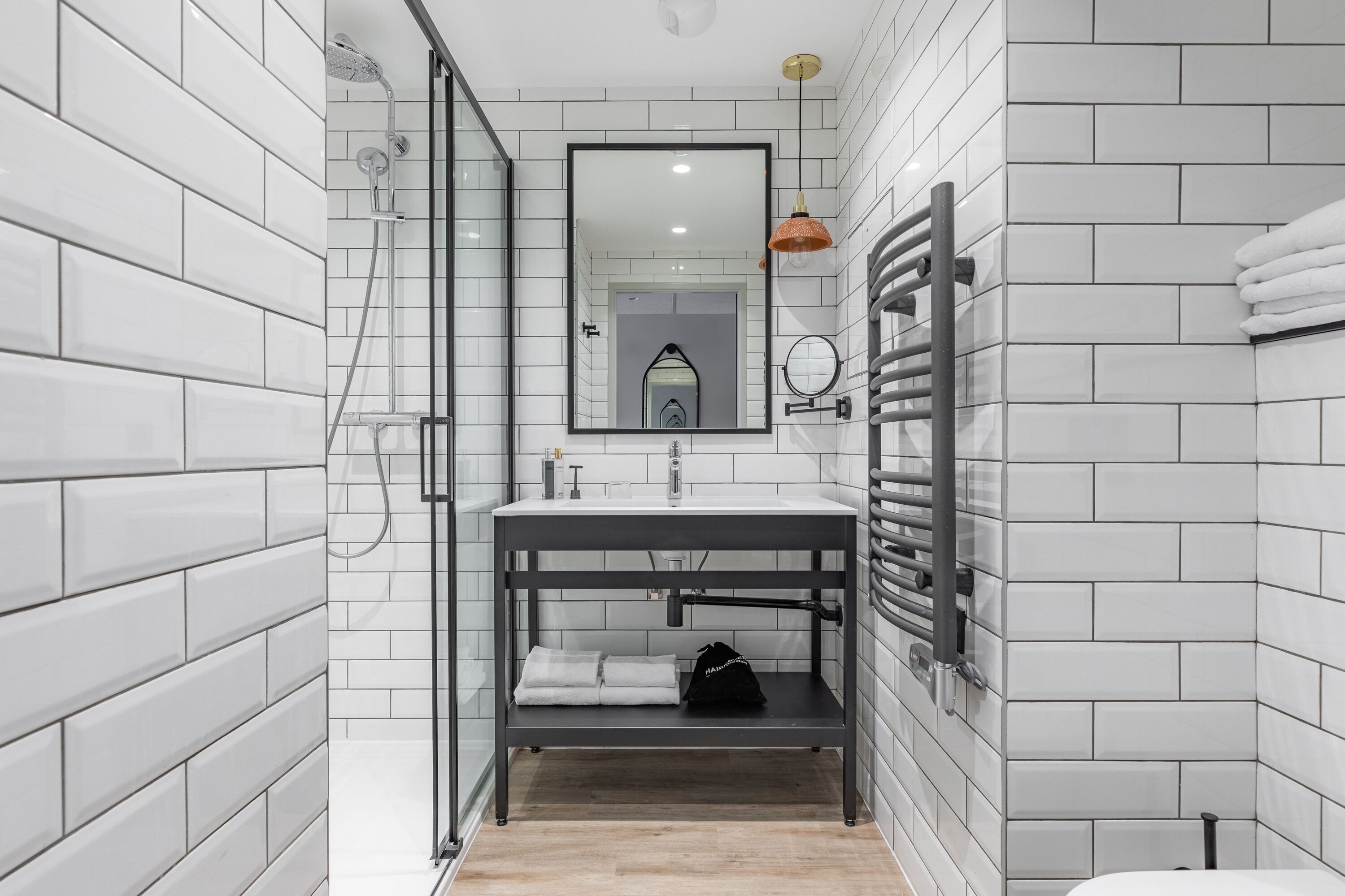 Shower, rainfall showerhead, hair dryer, towels