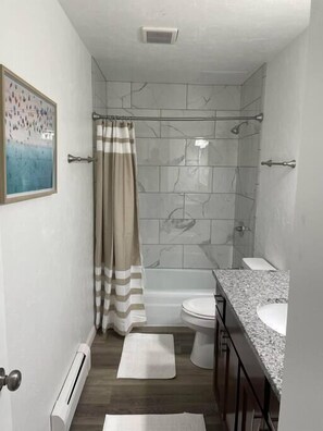 Hair dryer, towels, soap, shampoo