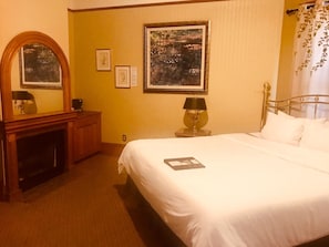 1 habitación, tabla de planchar con plancha y wifi