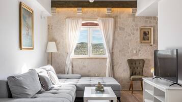 Villa, Multiple Beds | Living area | Fireplace