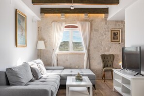 Villa, Multiple Beds | Living area | Fireplace
