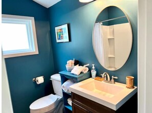 Shower, hair dryer, towels, soap
