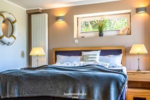 1 chambre, fer et planche à repasser, accès au Wi-Fi (inclus)