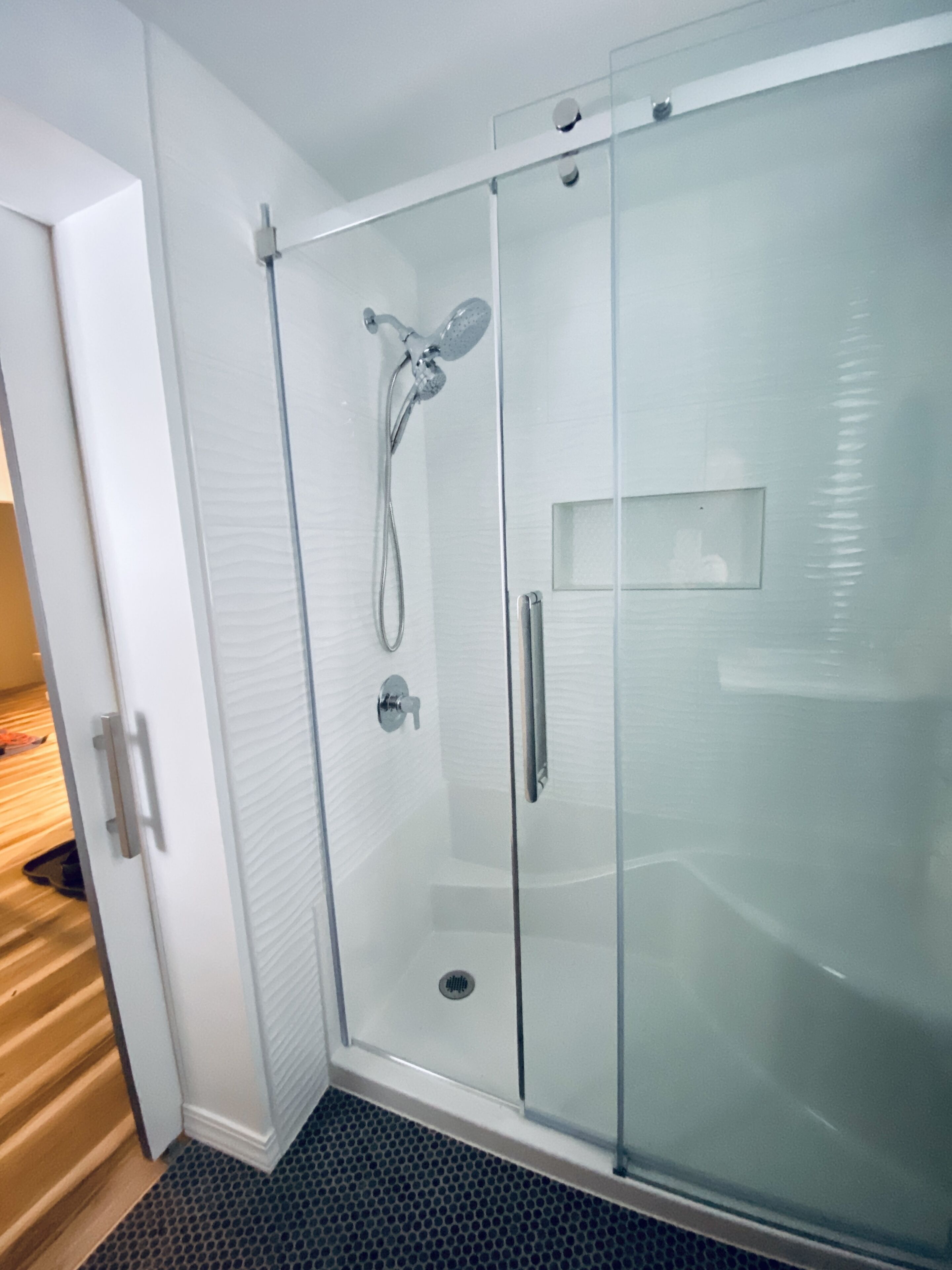 Shower, hair dryer, towels, toilet paper