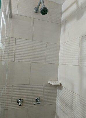 Shower, towels, soap, toilet paper