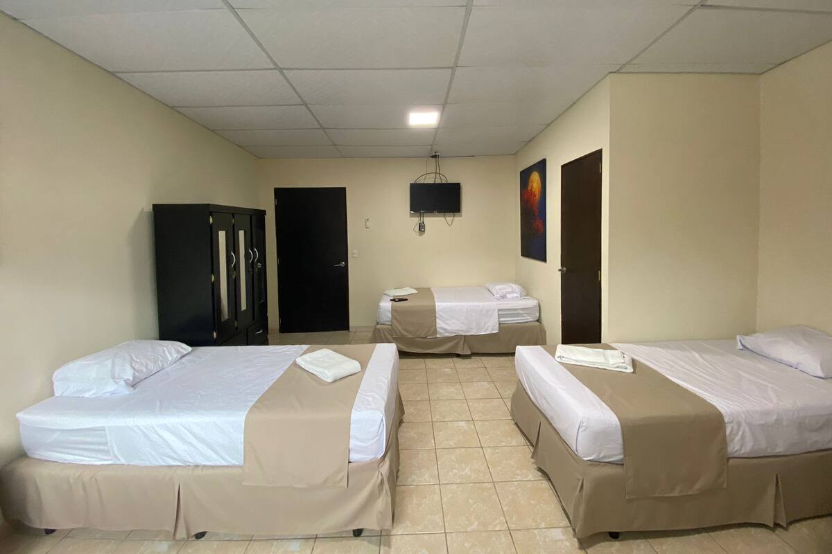 Standard Quadruple Room, Multiple Beds, Non Smoking | Free WiFi, bed sheets