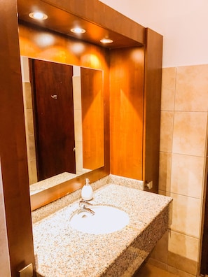 Shower, hair dryer, towels, toilet paper