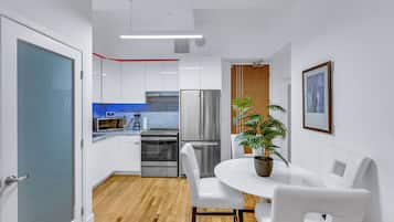 Departamento Deluxe, 2 habitaciones | Comedor