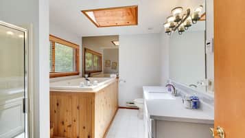 Shower, jetted tub, hair dryer, towels