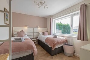 2 bedrooms, desk, iron/ironing board, travel cot