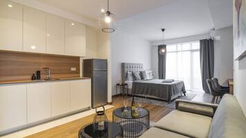 Royal Apartment | Living area | 32-inch Smart TV with cable channels, TV