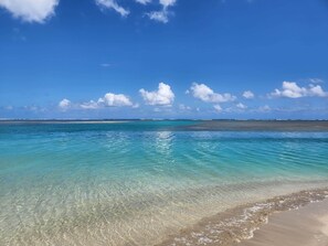 On the beach, sun-loungers, beach towels