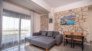 Appartement | Woonruimte | Een 39-inch lcd-televisie met satellietzenders en televisie