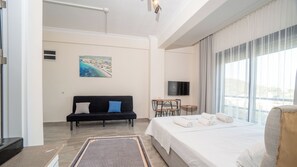 106-BODRUM | Living area | 39-inch LCD TV with satellite channels, TV - Capo Calaberno Aparts (Karaburun)