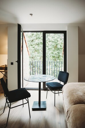 Habitación superior con 1 cama doble o 2 individuales | Escritorio, espacio para trabajar con un portátil, wifi gratis