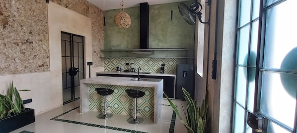 Fridge, microwave, stovetop, coffee/tea maker