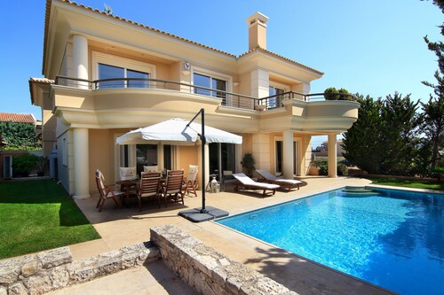 Contemporary luxury villa with eclectic design a few steps away from Varkiza bay
