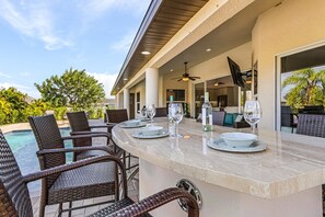 Outdoor dining - LET THE GOOD TIMES ROLL -Sparkling Heated Pool, - Villa Good Times and Tan Lines - Roelens Vacations (Cape Coral)
