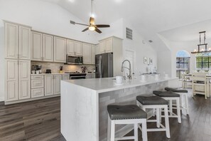 Fridge, microwave, oven, stovetop - LET THE GOOD TIMES ROLL -Sparkling Heated Pool, - Villa Good Times and Tan Lines - Roelens Vacations (Cape Coral)