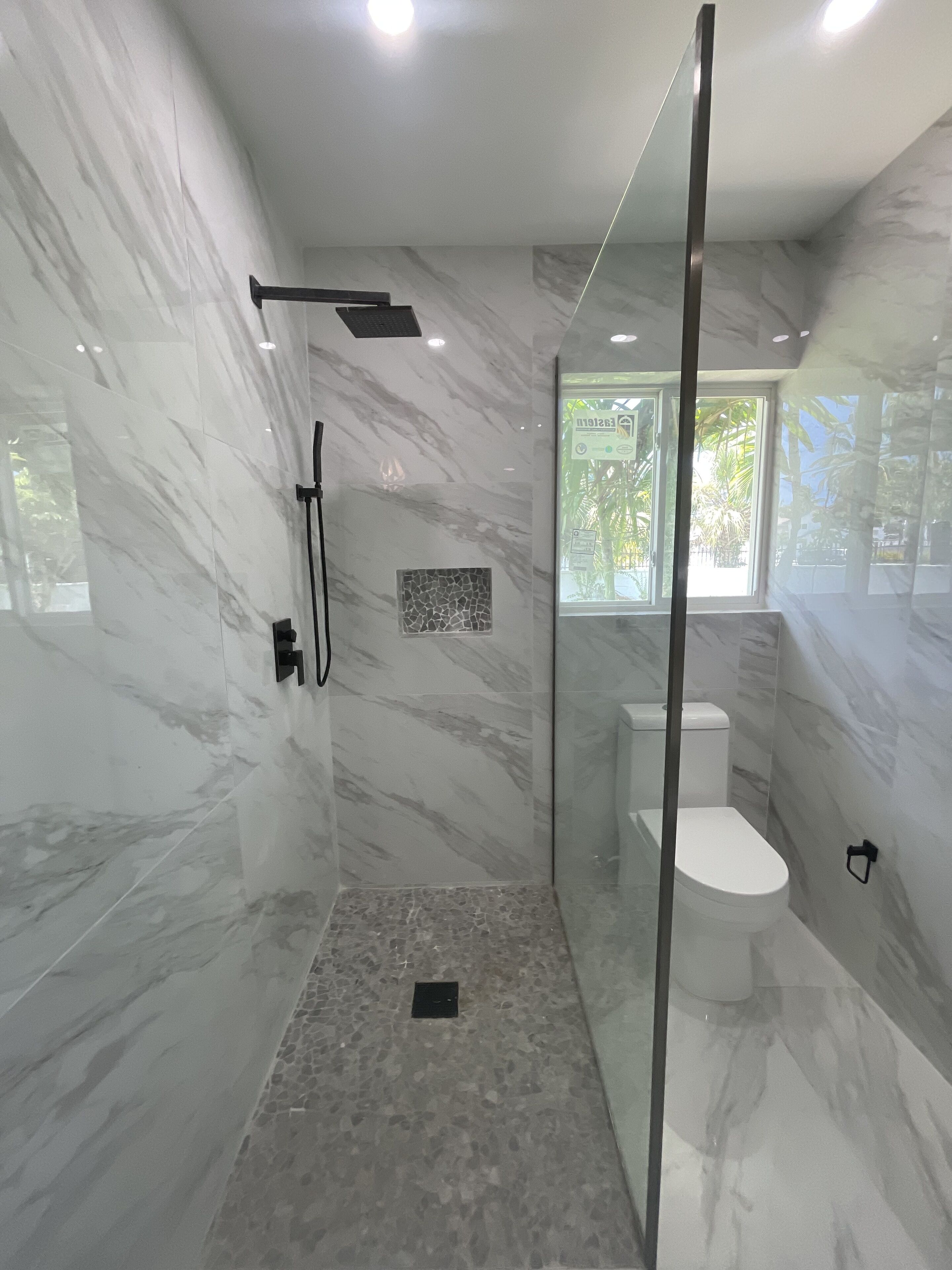 Shower, towels, toilet paper