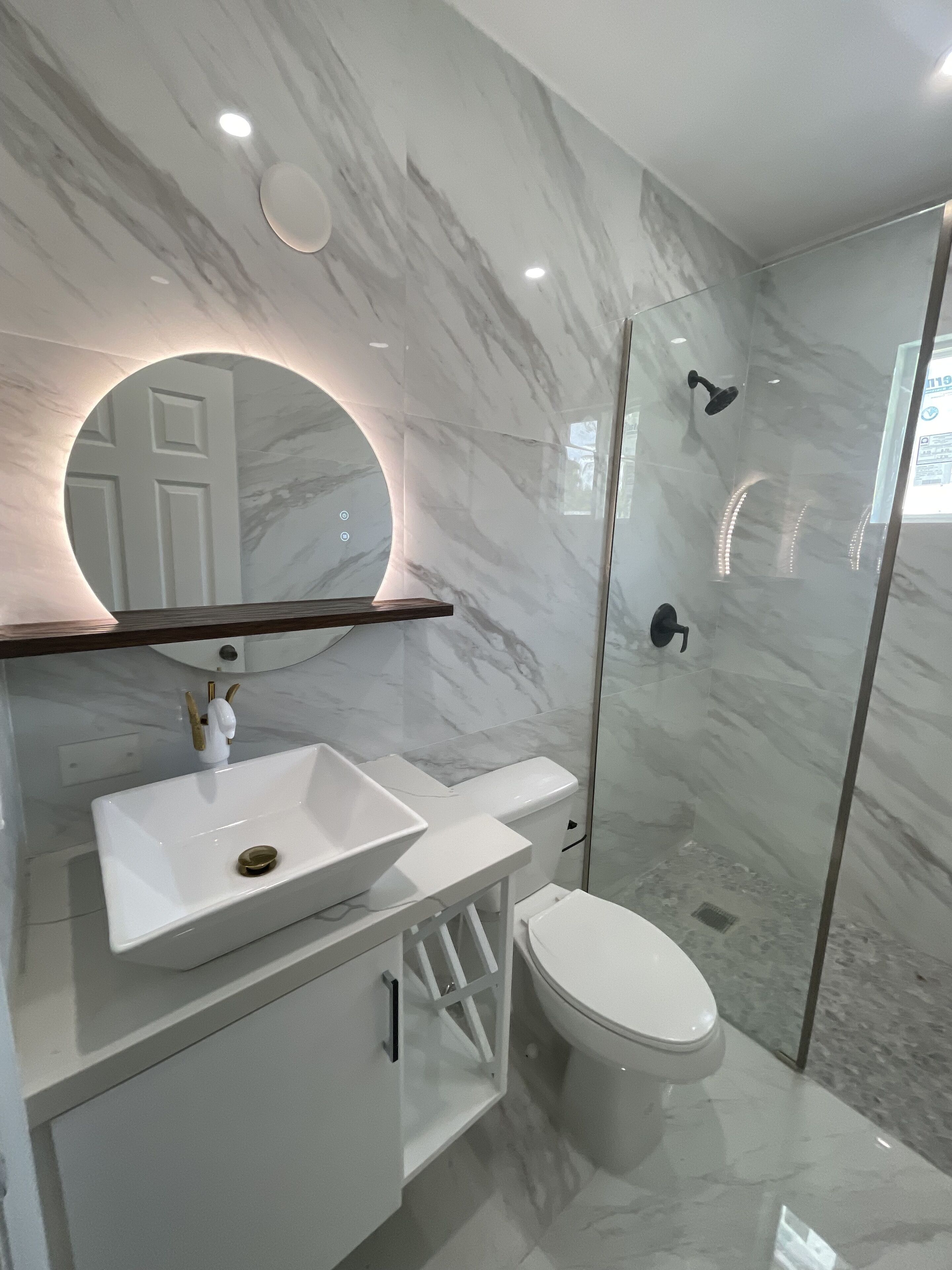 Shower, towels, toilet paper