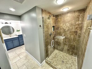 Shower, hair dryer, towels, soap
