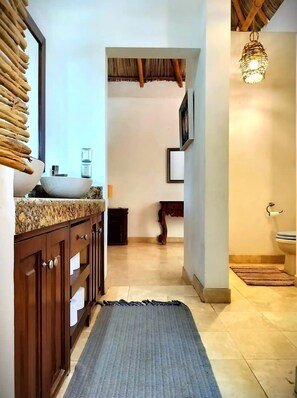 Shower, hair dryer, towels, toilet paper