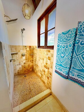 Shower, hair dryer, towels, toilet paper