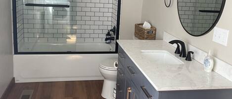 Shower, towels, soap, toilet paper