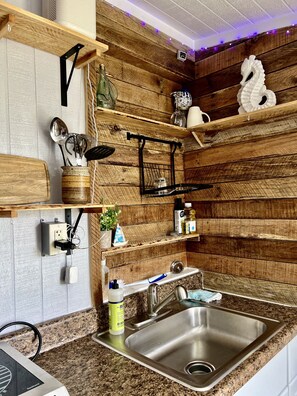 Fridge, microwave, coffee/tea maker, toaster