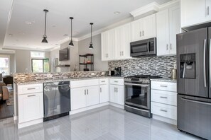 Fridge, microwave, oven, stovetop - Unbelievable Shaw 2BR w/ Backyard & W/D, nr Nightlife, by Blueground (Washington, D.C.)