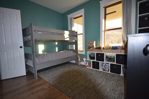 A bunk bed room with a desk and storage units. - Mustard Seed Farm Estate in Saluda, NC! (Saluda)