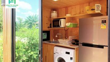 Fridge, microwave, stovetop, cookware/dishes/utensils
