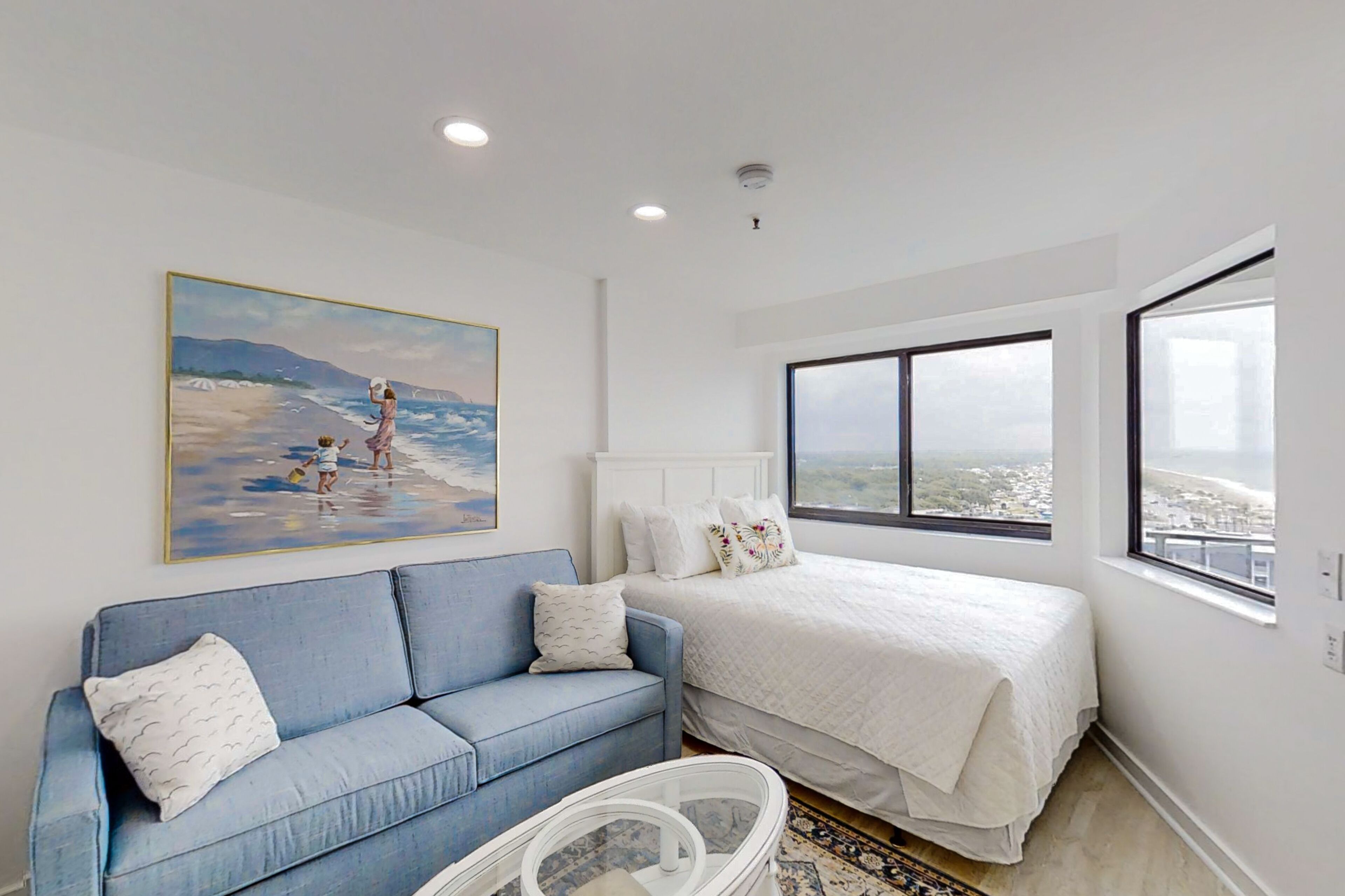 Beachfront studio with ocean-view balcony, pool, hot tub, tennis, & gym