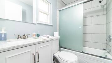 Bathtub, hair dryer, towels