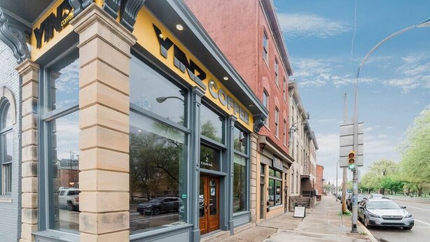 A storefront with large windows and a sign that reads 'YIN COFFEE.' - -- AGH Walkable - Free Parking - Washer & Dryer -- (Pittsburgh)